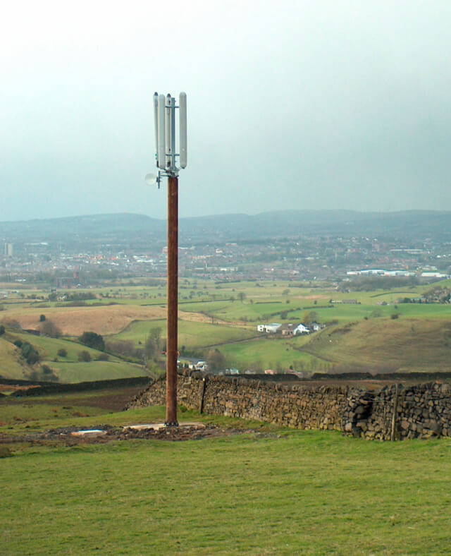 A telegraph pole erected in a greenfield site.