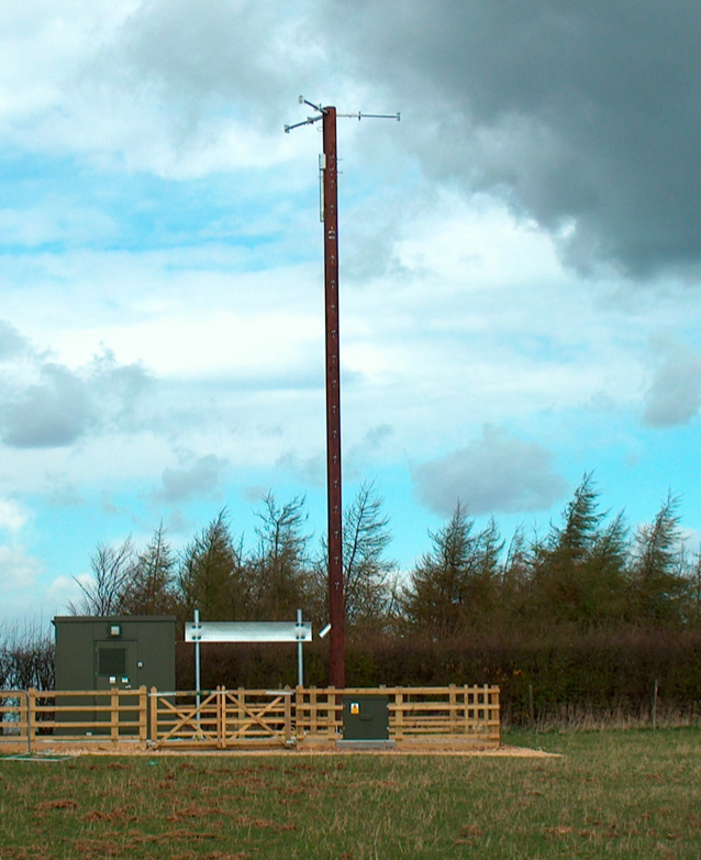 A large climbable telegraph pole erected in a greenfield site.